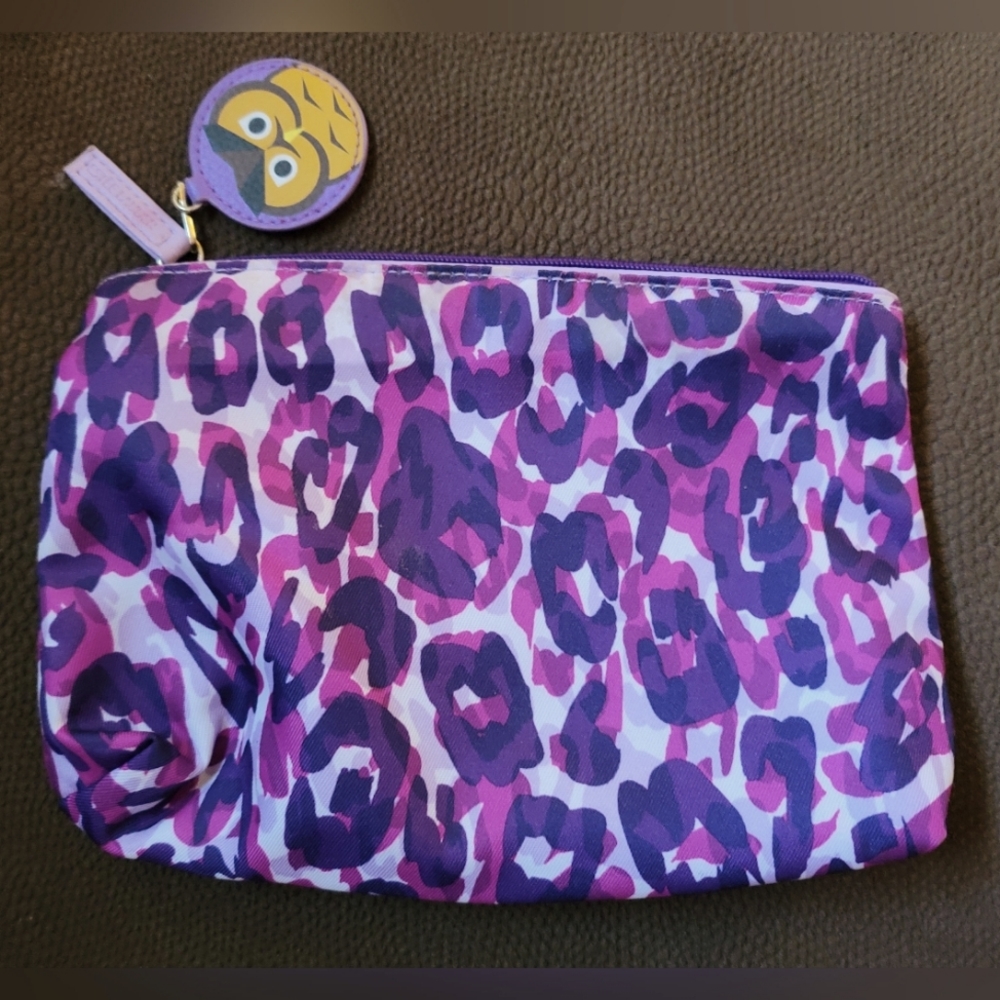 Estee Lauder small purple makeup pouch. Super cute.